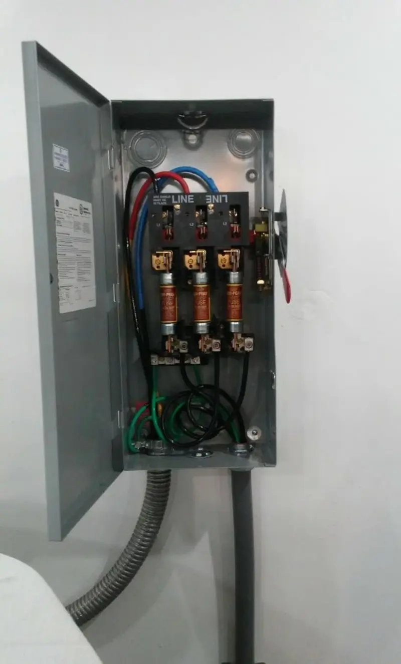 Three-phase disconnect switch installed for Smoke Detector Installation in Bell